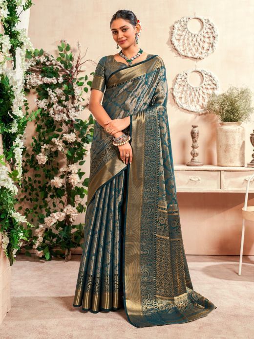 Fascinating Teal Blue Zari Weaving Silk Event Wear Saree With Blouse